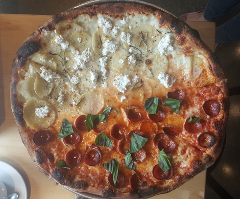 A Pizzeria Bebu pie: half-potato, half-pepperoni